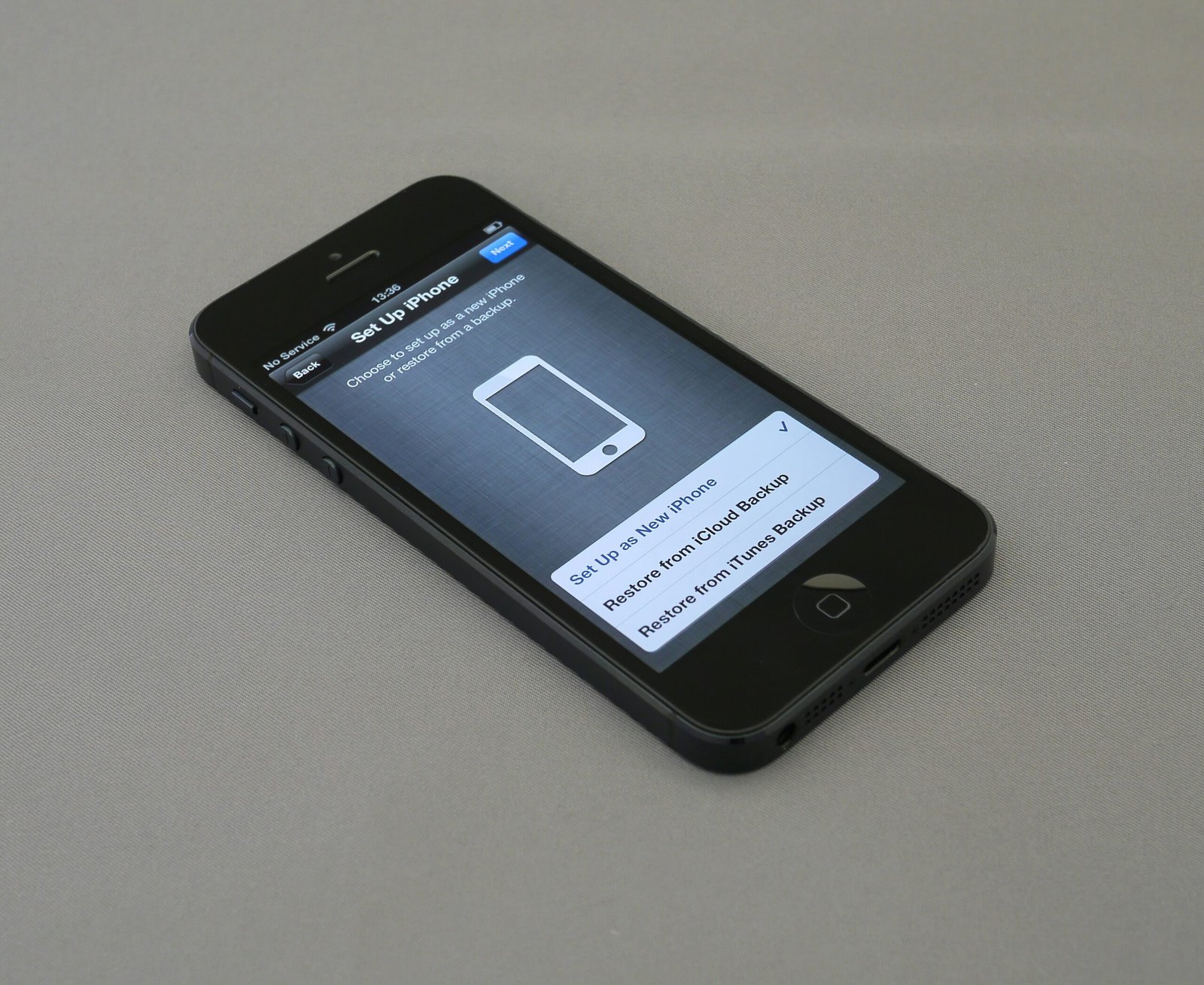 How do I get my phone out of SOS mode and restore cellular service